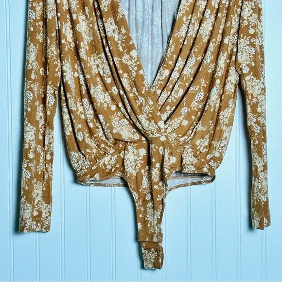FREE PEOPLE Turnt Surplice Bodysuit in a copper floral print Medium NWT - Picture 7 of 11